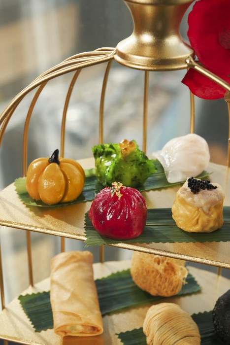 Each layer is designed to delight the senses and invite discovery. Begin at the top with a selection of savoury dumplings to awaken the palate – from Crystal Har Gau with fresh shrimp, to Perilla Roast Duck & Pumpkin, and the Spicy Crunch vegan dumpling, each a perfect balance of flavour and texture.
Continue your journey with comforting classics such as the Deep-Fried Taro Puff filled with sweet pork and taro, or the Yu Xiang Crispy Pork Dumpling, a Hutong favourite.
